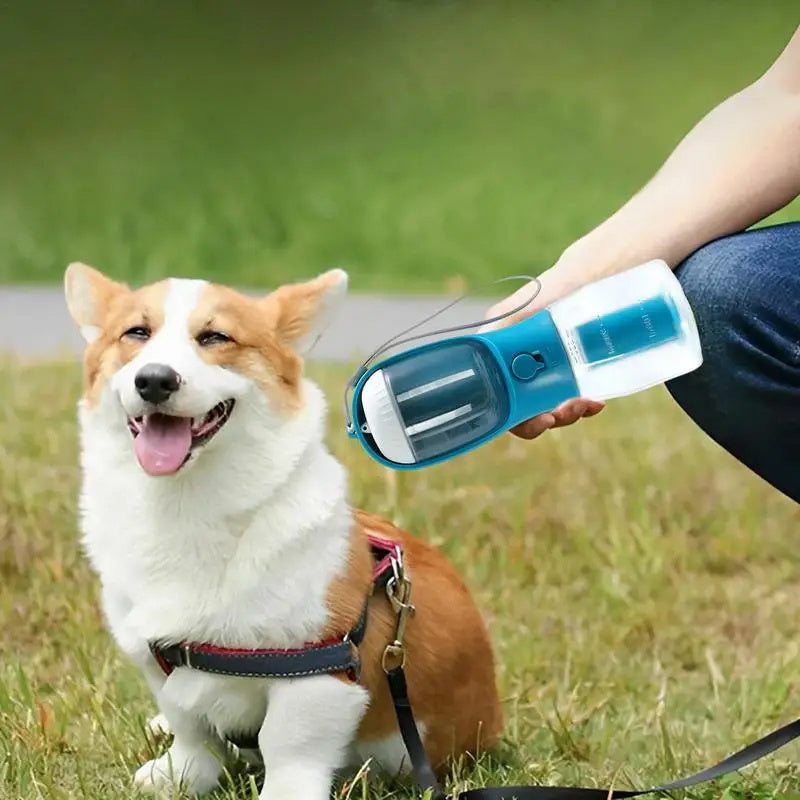 All-in-One Pet Travel Water Bottle – 300ml Feeder with Food & Waste Bag