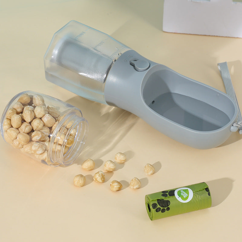 All-in-One Pet Travel Water Bottle – 300ml Feeder with Food & Waste Bag